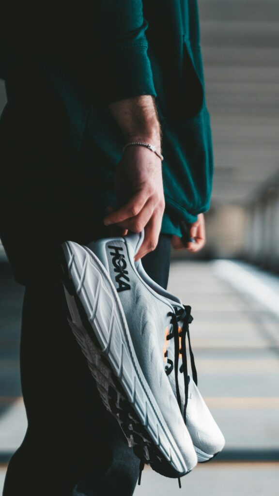 Light gray HOKA running shoe