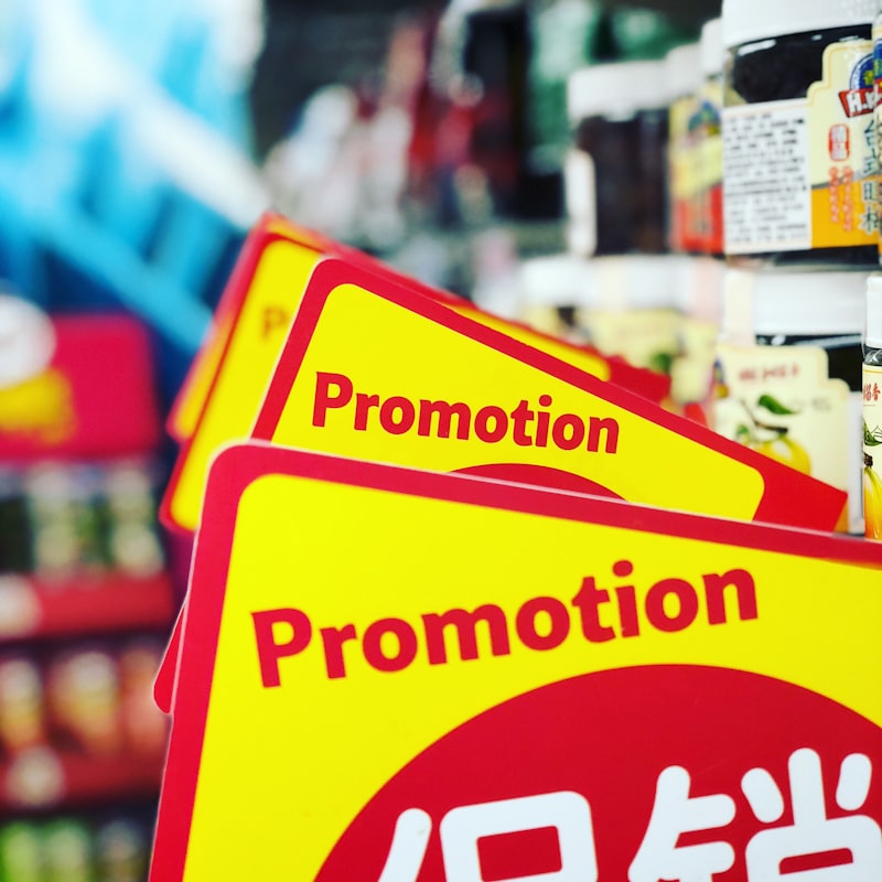 Sale sign in store - price anchoring is a common cognitive bias in shopping