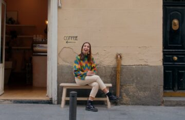 Marta Puerto sitting outside a coffee shop - Meet Marta The Movie