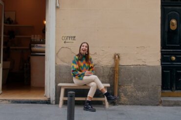 Marta Puerto sitting outside a coffee shop - Meet Marta The Movie